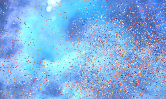 Konfettia taivasta vasten.